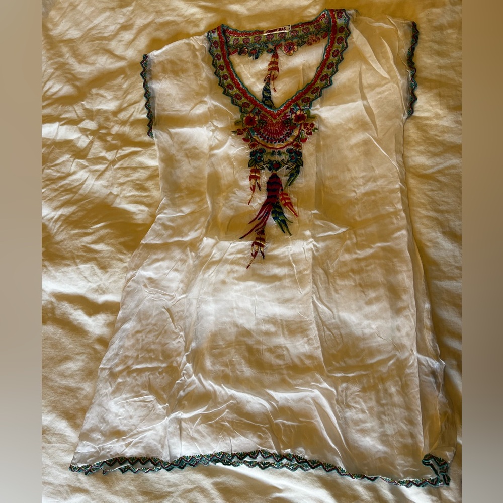 Johnny Was white dress with flower and feather embroidery.
